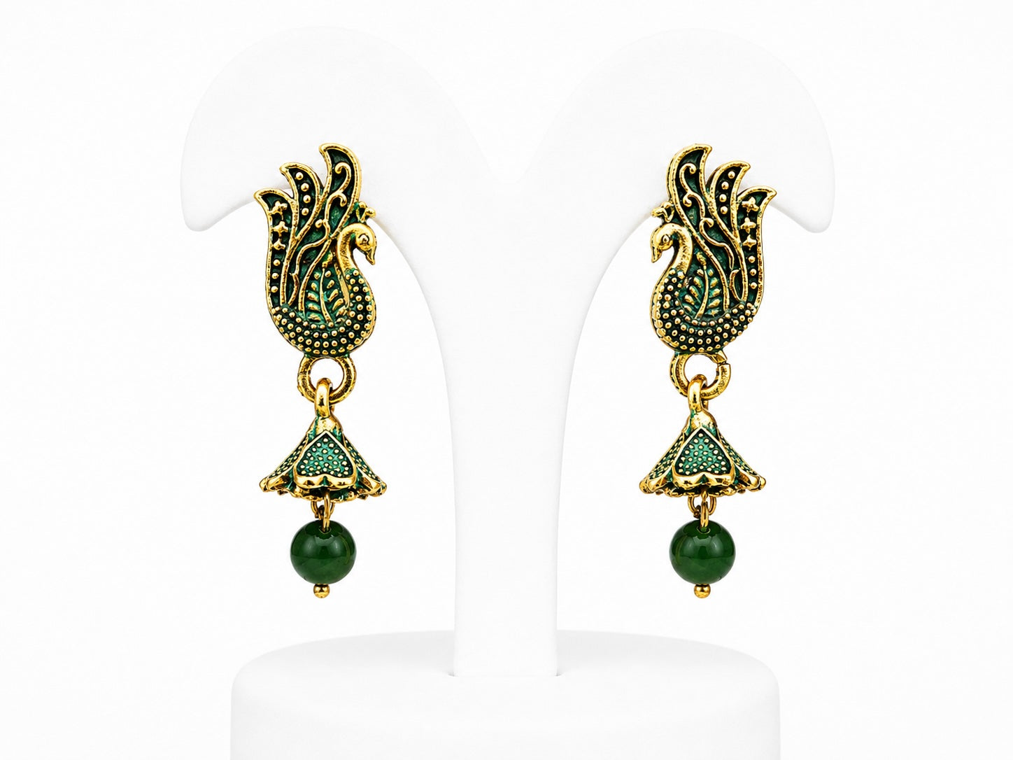 Pair of gold and green earrings on a white background