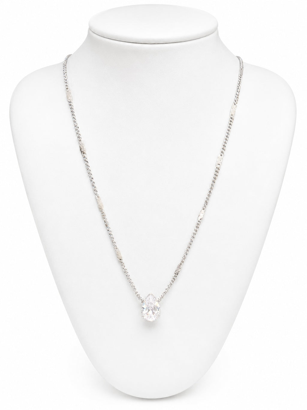 Necklace with a pendant on a white mannequin bust