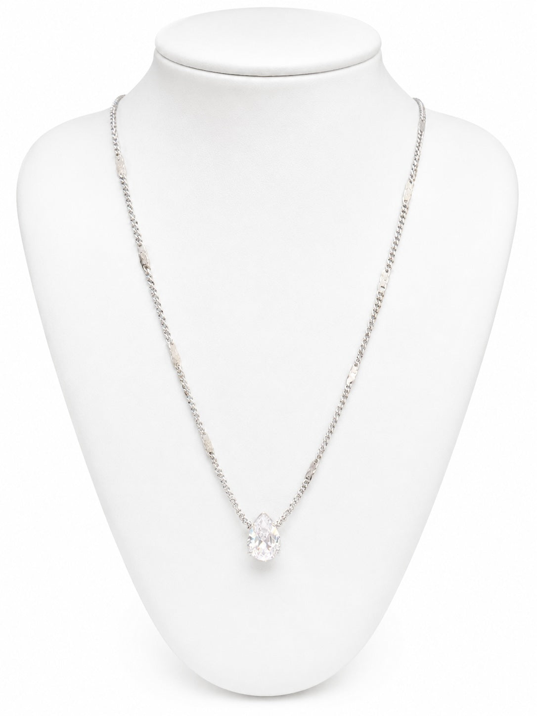 Necklace with a pendant on a white mannequin bust