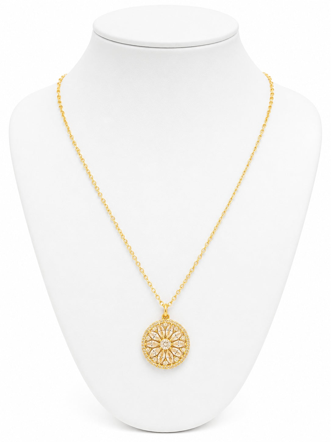 Gold necklace with a circular pendant on a white mannequin bust.