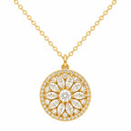 Gold necklace with a round, diamond-studded pendant on a white background