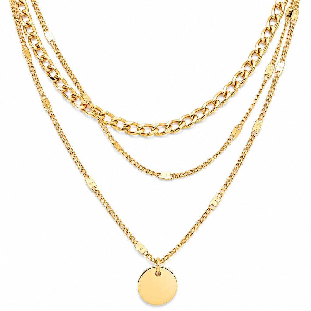Three gold necklaces with different chain styles on a white background
