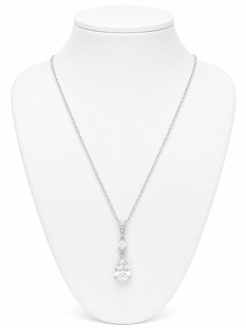 Necklace with a pendant on a white mannequin bust