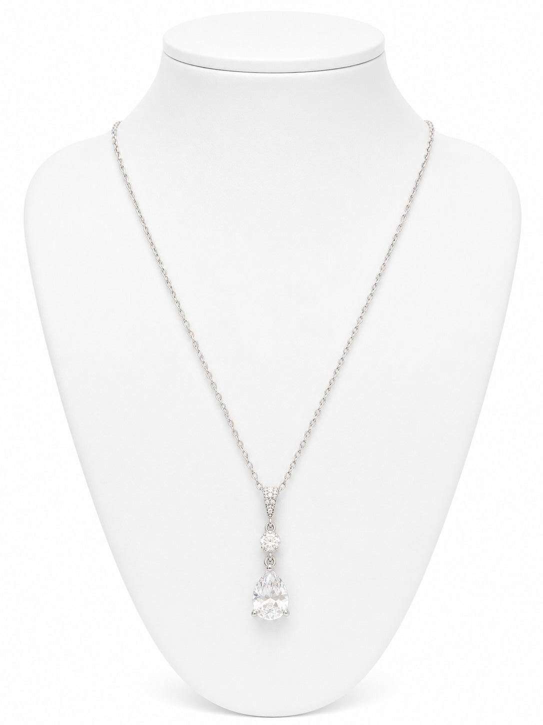 Necklace with a pendant on a white mannequin bust