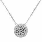 Silver necklace with a round, intricate pendant on a white background