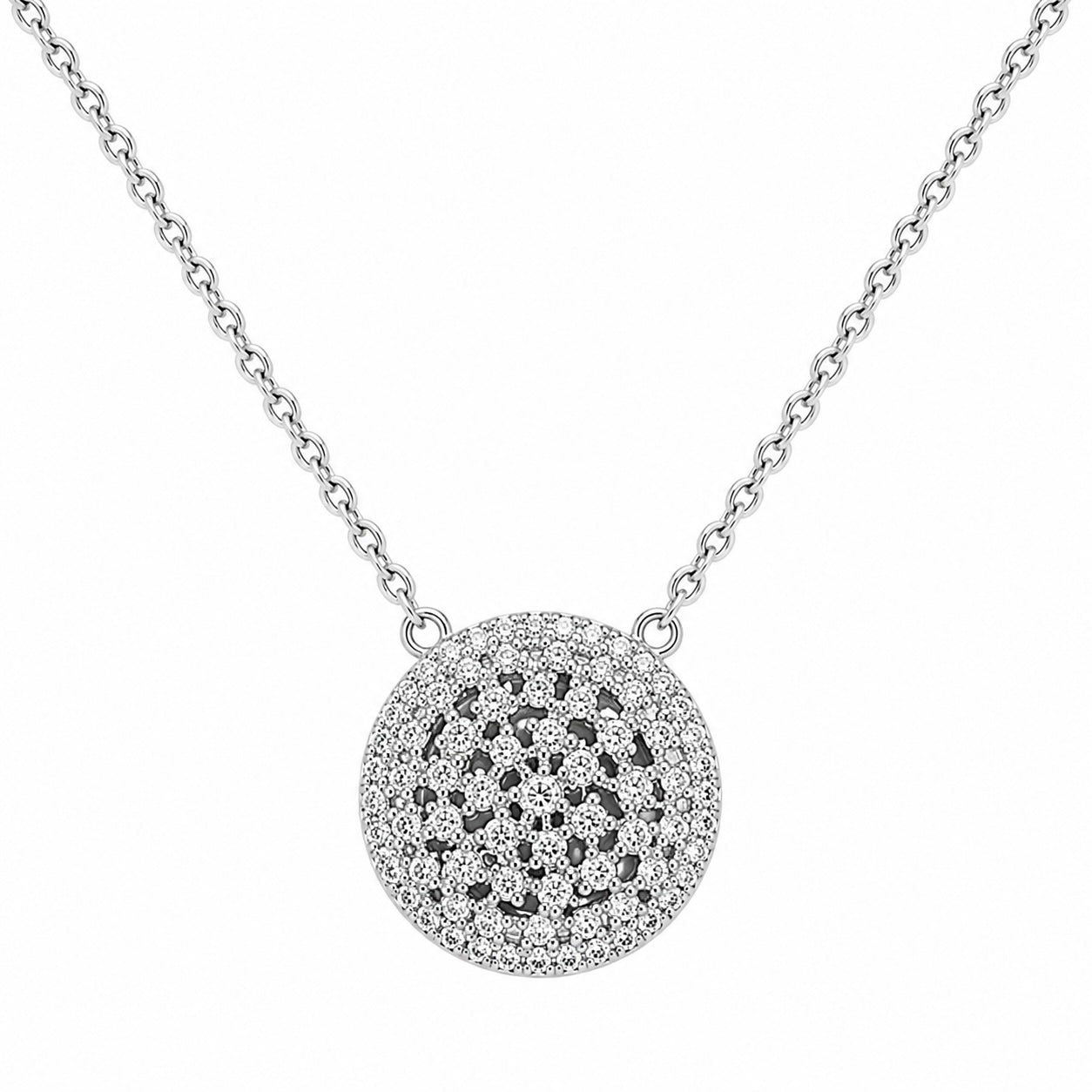 Silver necklace with a round, intricate pendant on a white background