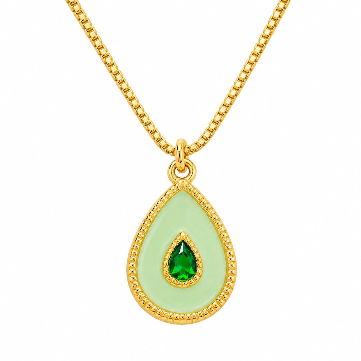 Gold necklace with a green teardrop pendant on a white background