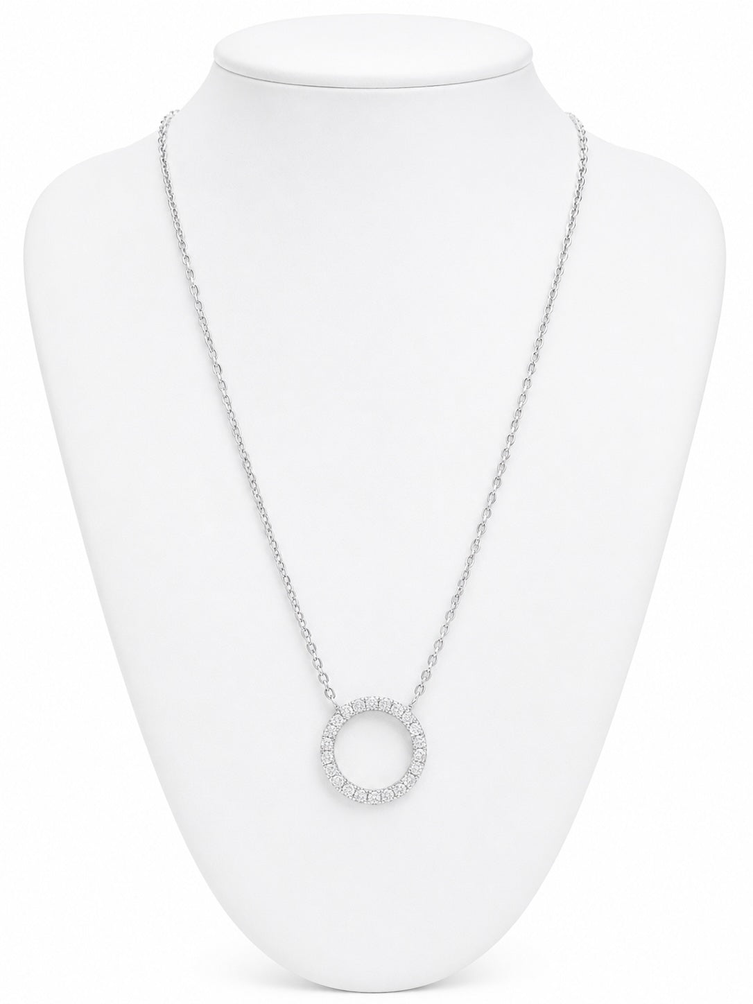 Silver necklace with a circular pendant on a white mannequin bust.