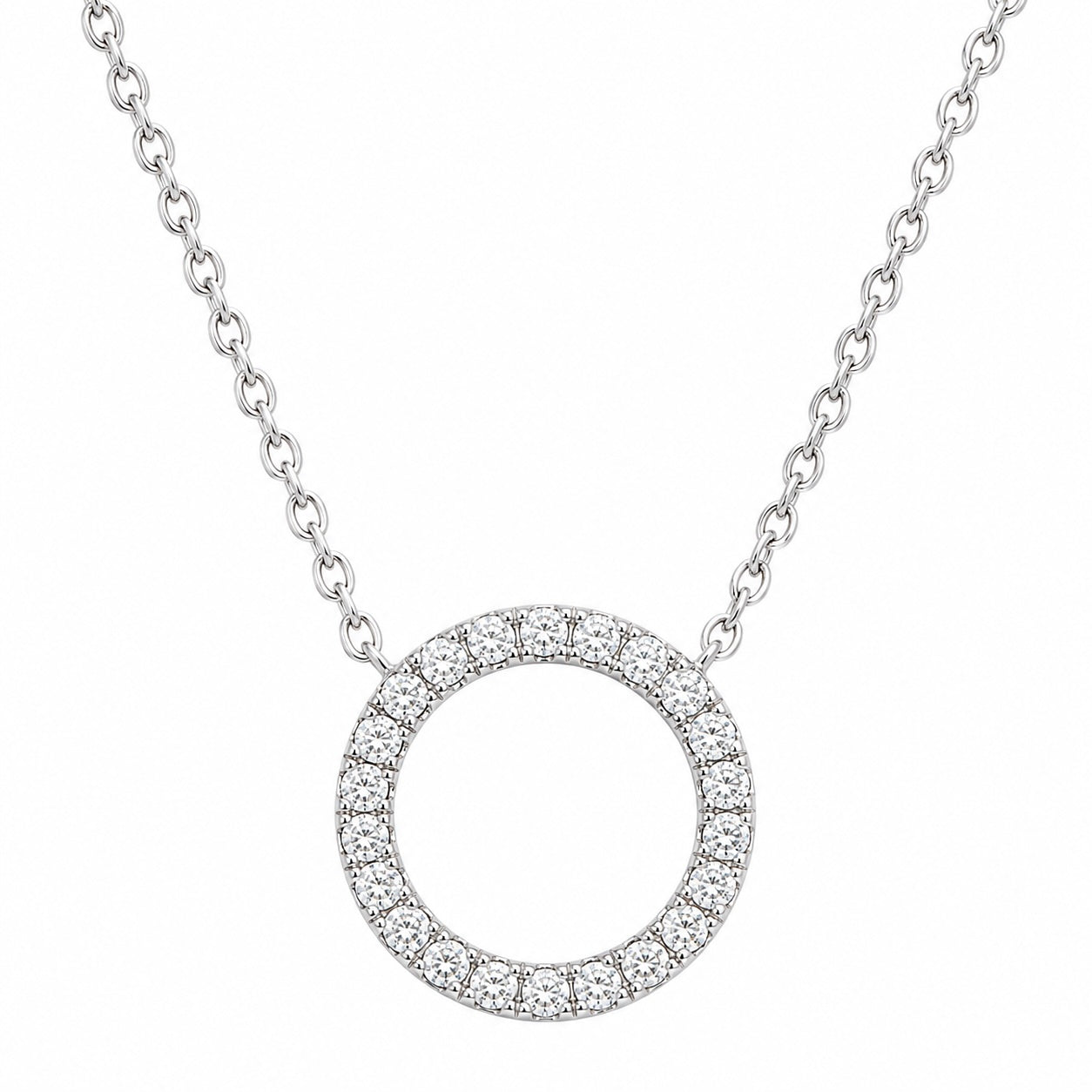Silver necklace with a circular pendant on a white background