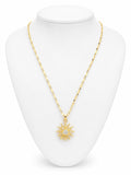 Gold necklace with a star pendant on a white mannequin bust