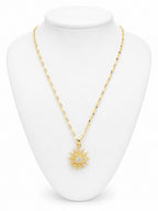 Gold necklace with a star pendant on a white mannequin bust