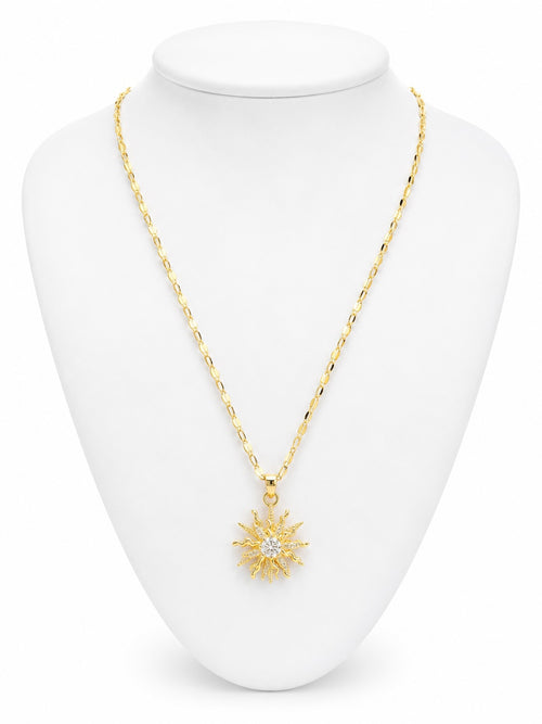 Gold necklace with a star pendant on a white mannequin bust