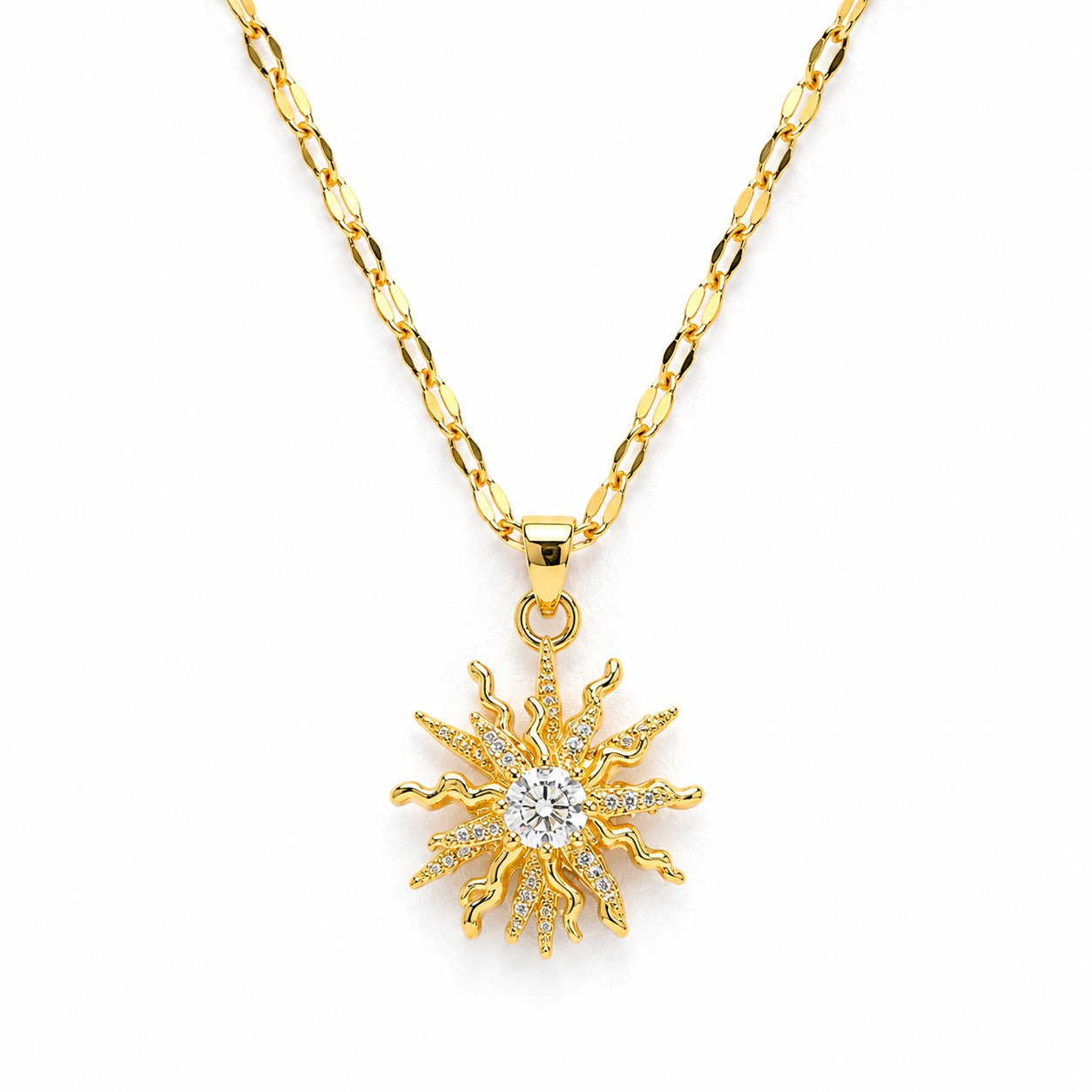 Gold sun-shaped pendant necklace on a white background