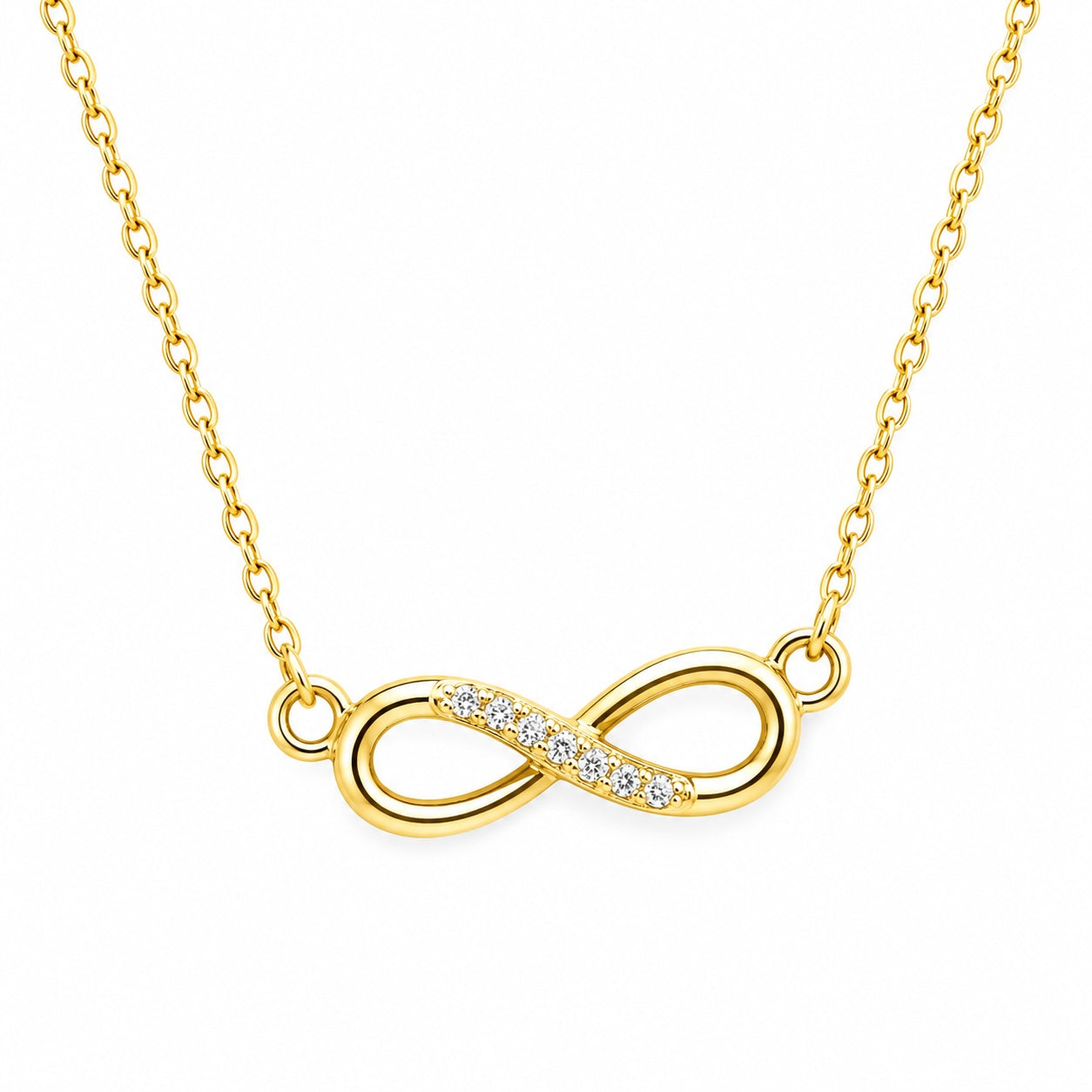 Gold infinity necklace with diamonds on a white background