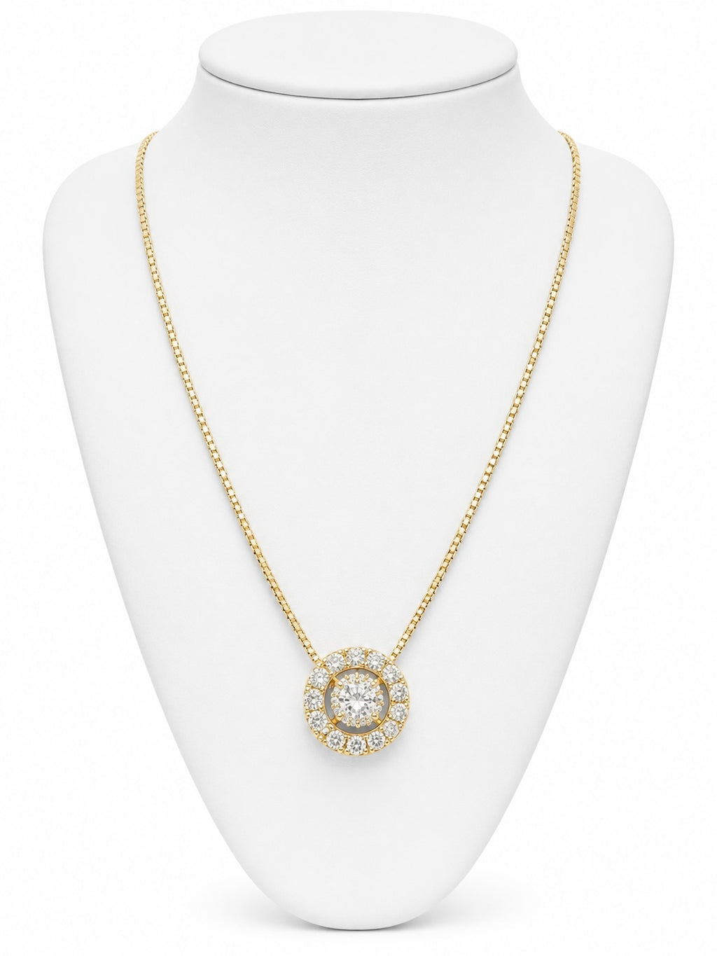 Gold necklace with a diamond pendant on a white mannequin bust
