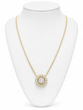 Gold necklace with a diamond pendant on a white mannequin bust