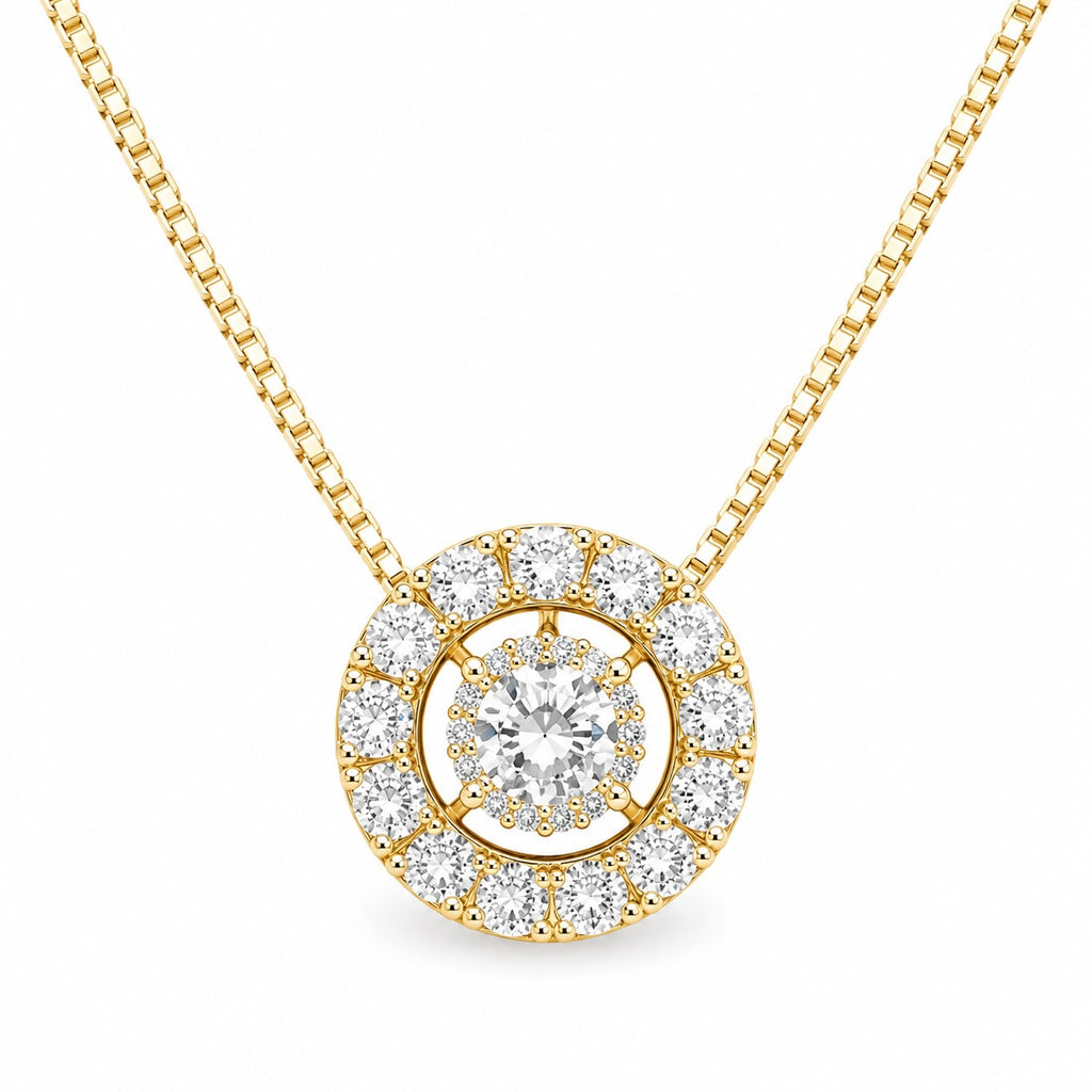 Gold necklace with a round diamond pendant on a white background
