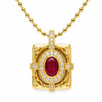 Gold pendant with a red gemstone and diamonds on a white background