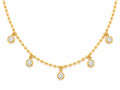 Gold necklace with diamond pendants on a white background