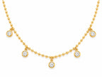 Gold necklace with diamond pendants on a white background
