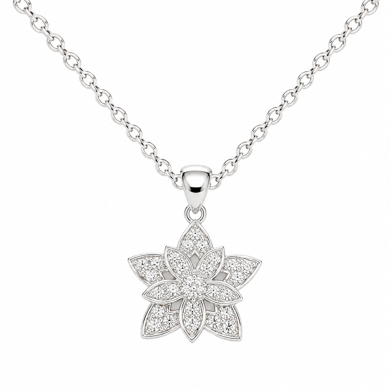 Silver flower-shaped pendant necklace on a white background