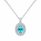 Diamond necklace with a blue gemstone on a white background