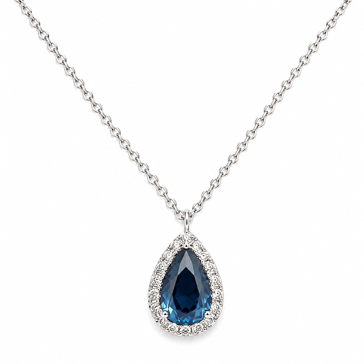 Teardrop-shaped blue gemstone necklace on a white background