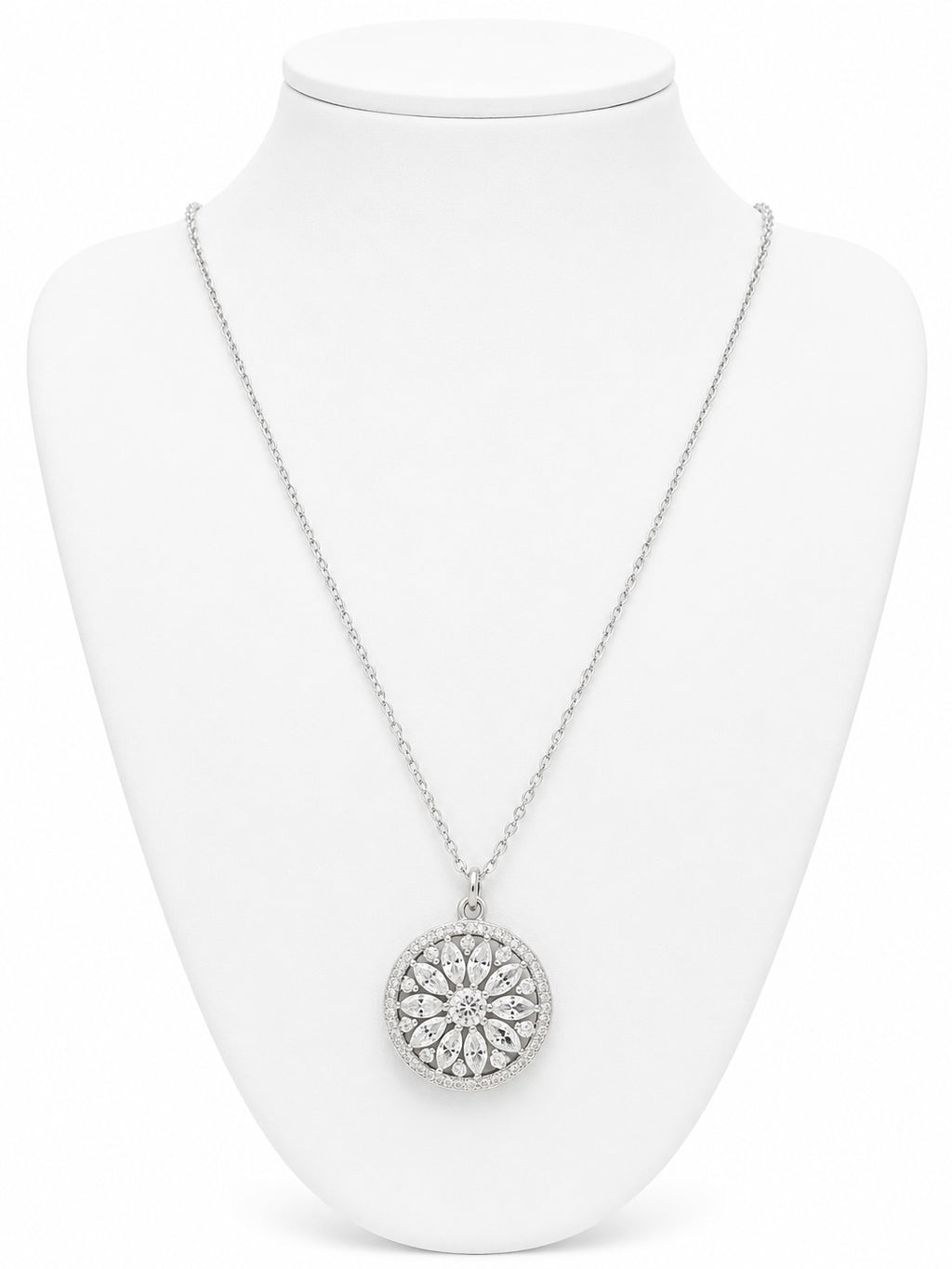 Silver necklace with a circular pendant on a white mannequin bust.