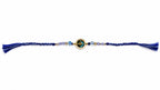 A blue and gold beaded rakhi with braided ends and tassels, displayed horizontally on a plain white background.