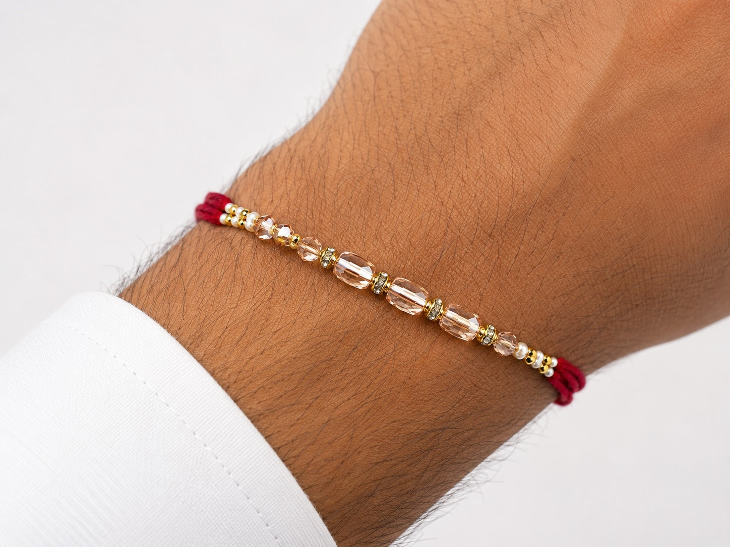 Minimalist Pearl & Gold Bead Rakhi – Elegant Handmade Raksha Bandhan Bracelet
