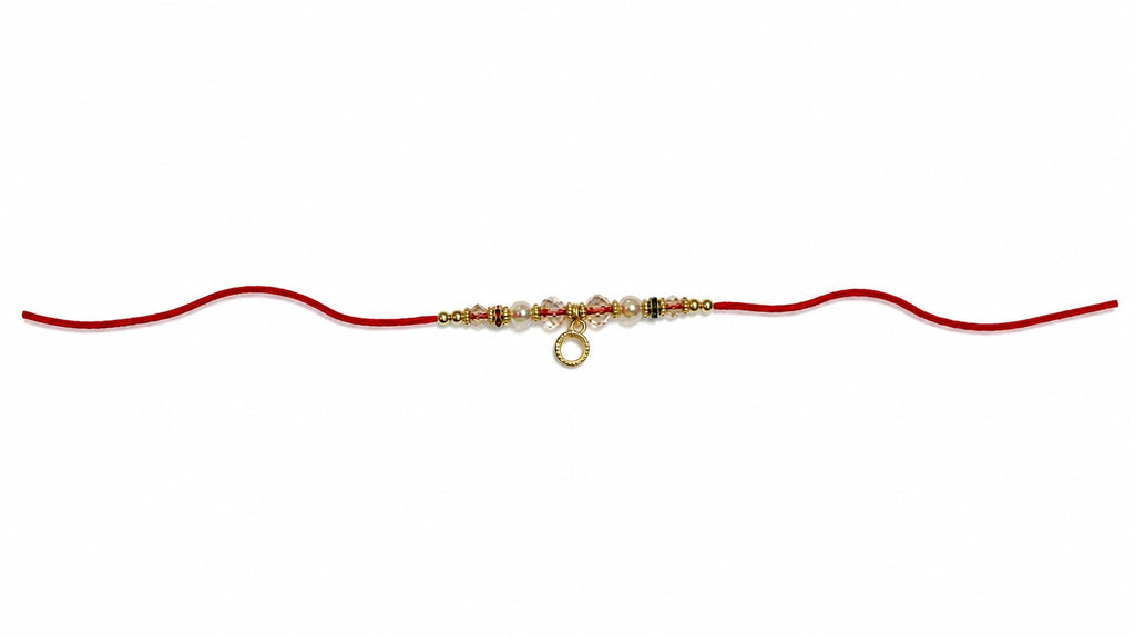 Minimalist Pearl & Crystal Rakhi – Elegant Designer Rakhi for Brother