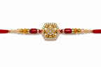 Royal Hexagon Crystal Rakhi – Premium Gold Designer Rakhi for Brother