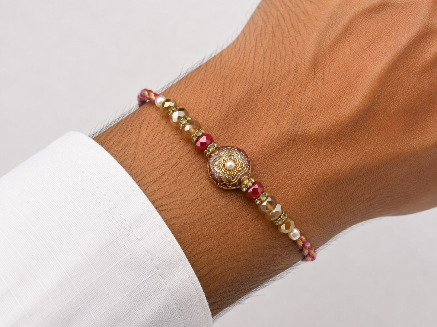 Premium Designer Rakhi with Gold Floral Centerpiece