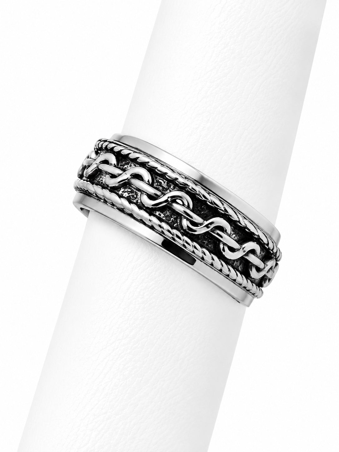 Silver chain ring on a white background