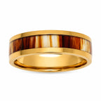 Gold ring with a wooden inlay on a white background