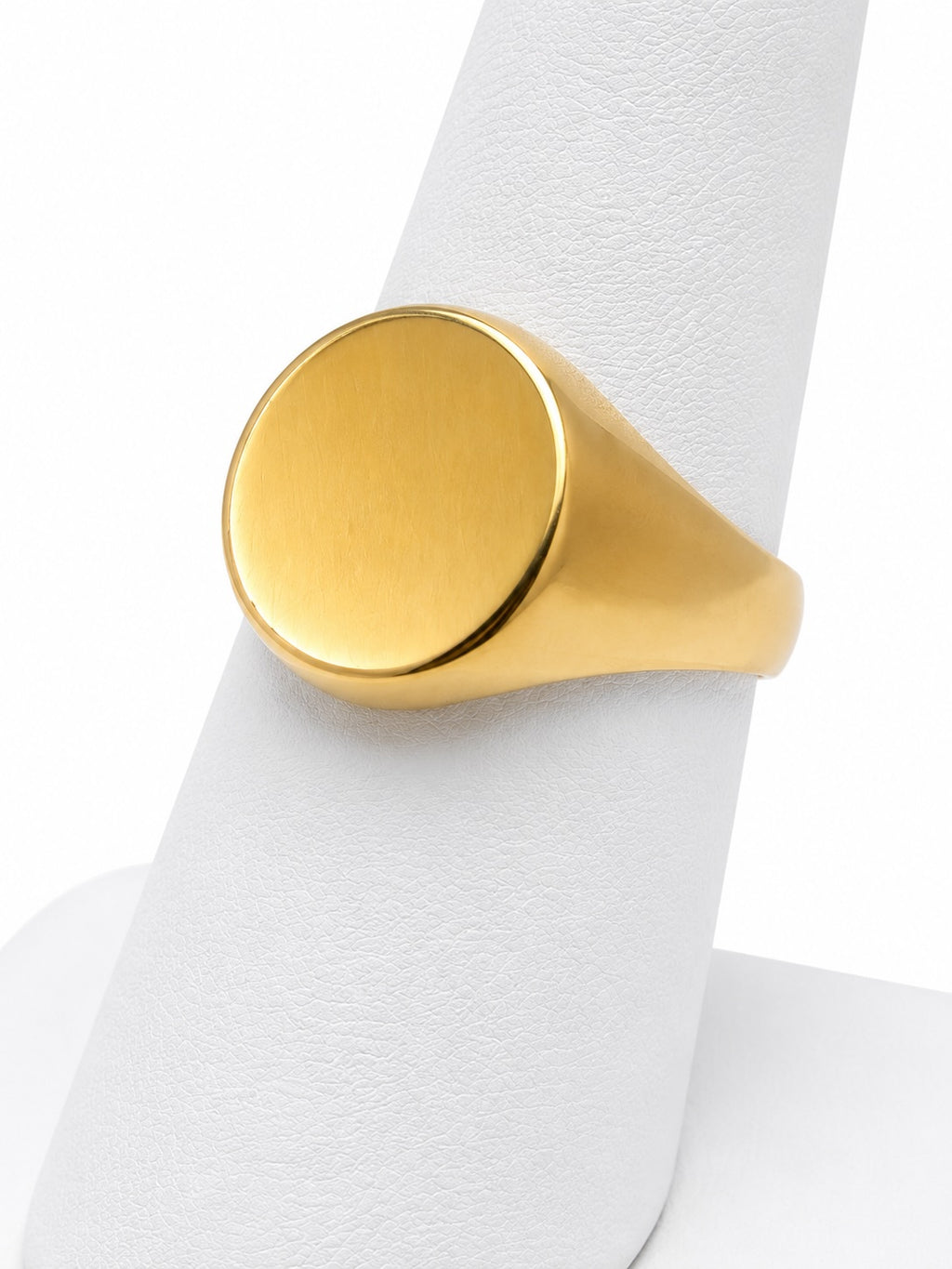 Gold ring on a white background