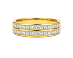 Gold ring with diamond accents on a white background