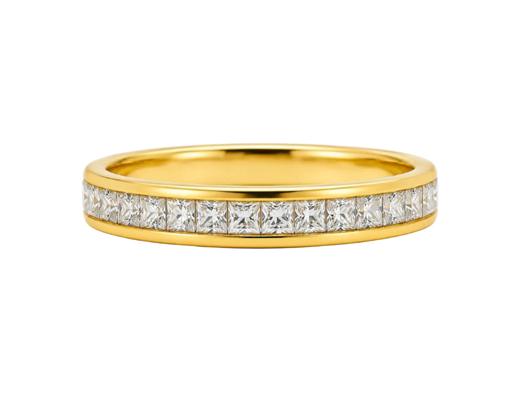 Gold ring with diamonds on a white background