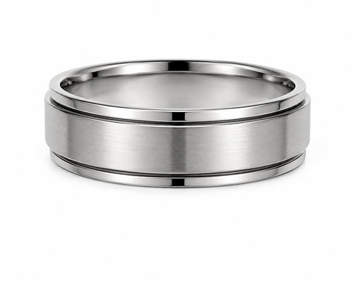 Silver ring with a brushed finish on a white background