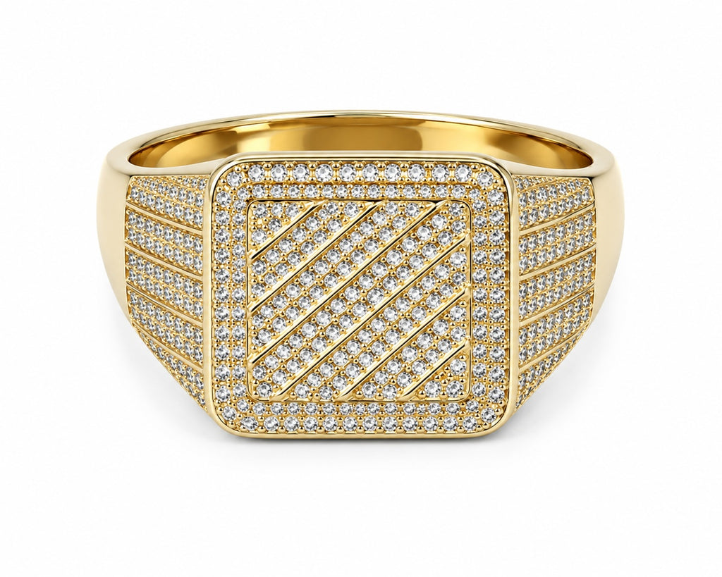 Gold ring with diamond-studded design on a white background