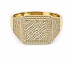 Gold ring with diamond-studded design on a white background
