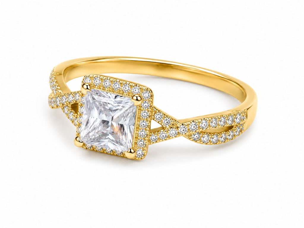 Gold ring with a large diamond and smaller diamonds on a white background