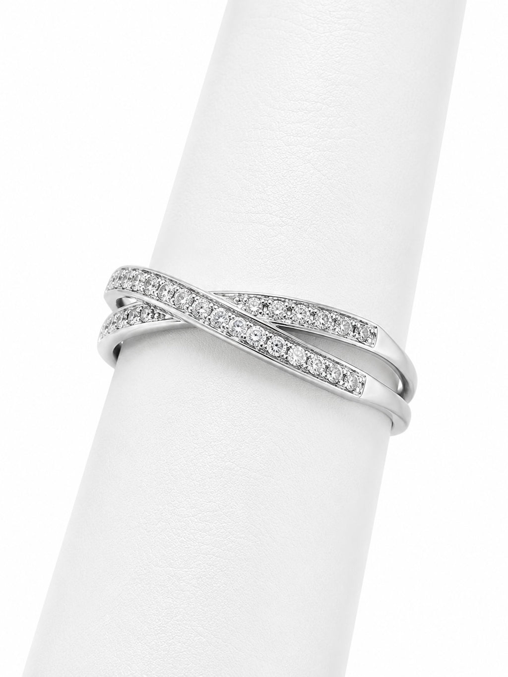 Silver ring with diamonds on a white background