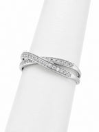 Silver ring with diamonds on a white background