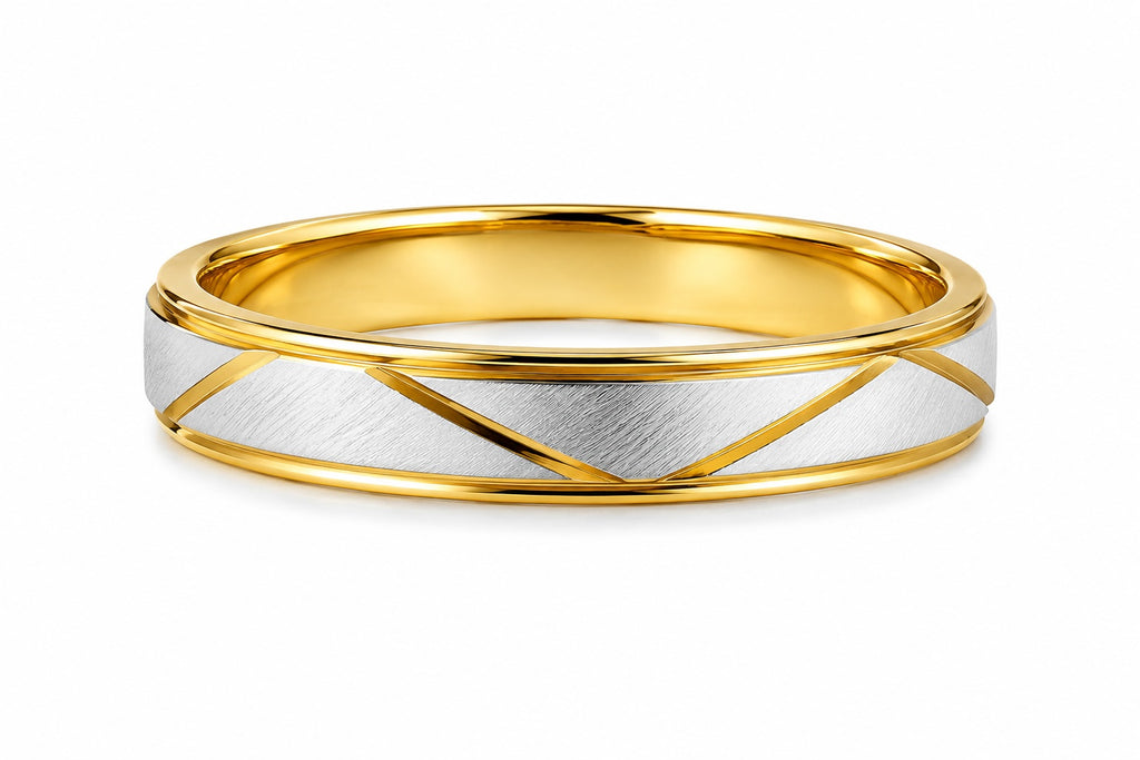 Two-tone gold and silver ring on a white background
