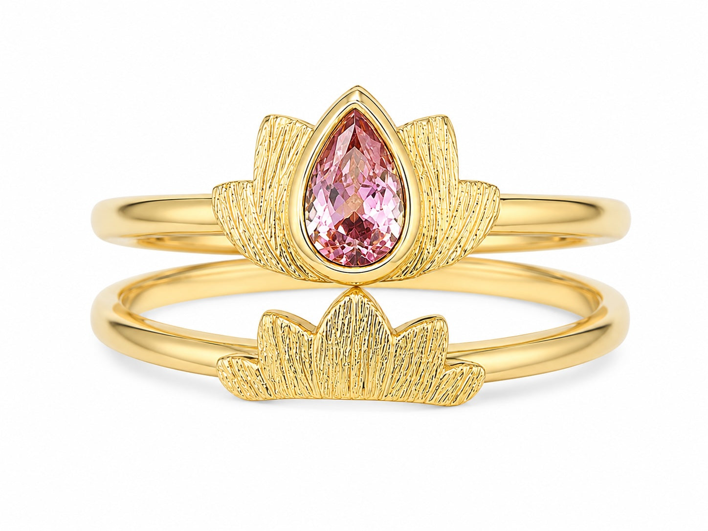 Gold ring with a pink gemstone on a white background
