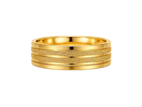 Gold ring with textured band on a white background