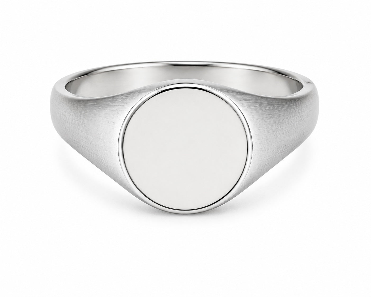 Silver signet ring on a white background