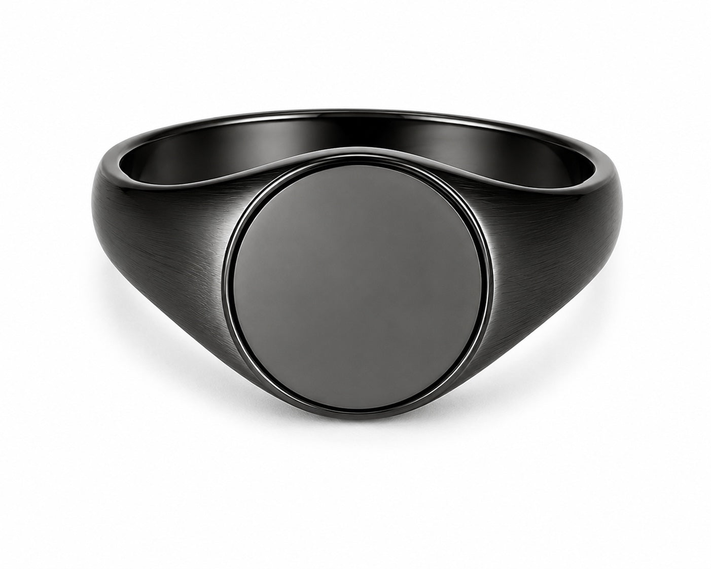 Black signet ring on a white background
