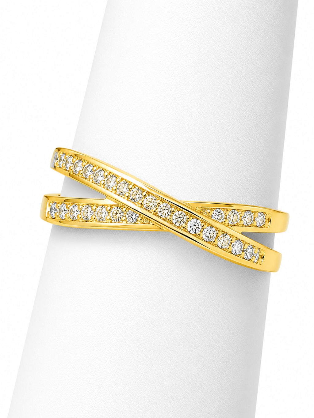 Gold ring with diamond accents on a white background